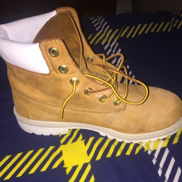 brown timberlands with white sole